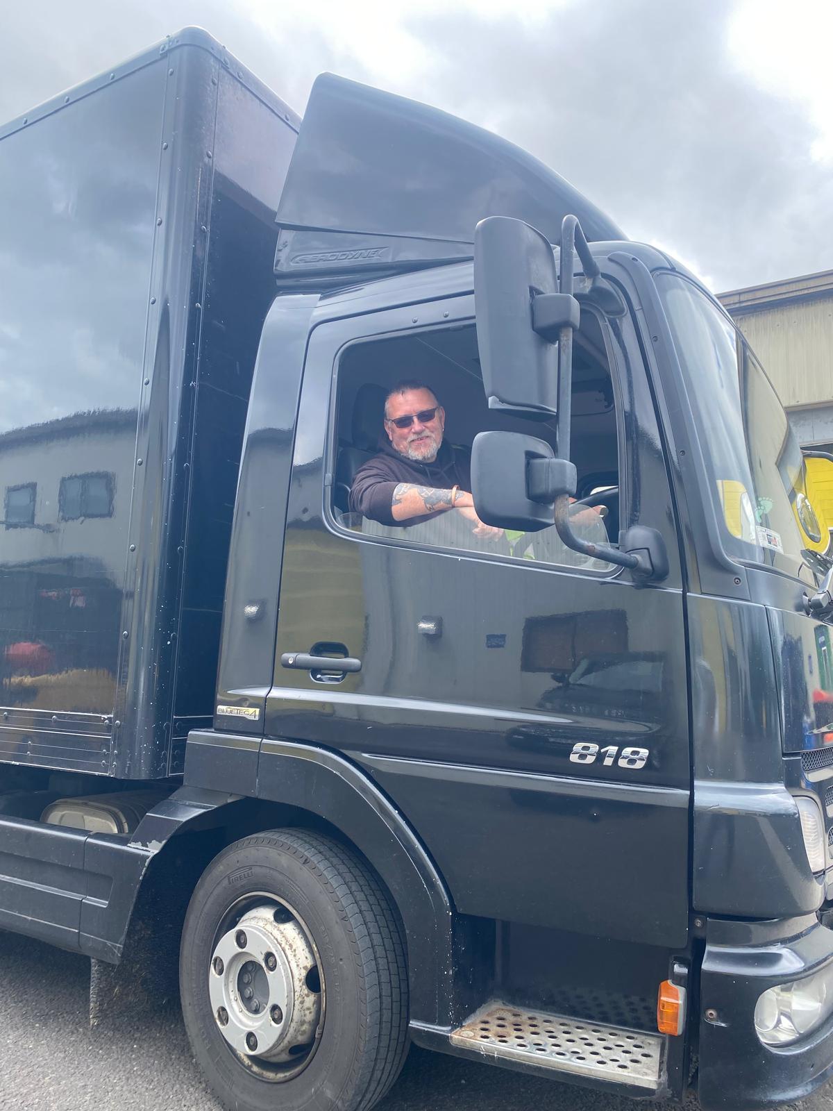 Trev loading finished cabinets into the dispatch lorry at the Calne workshop.