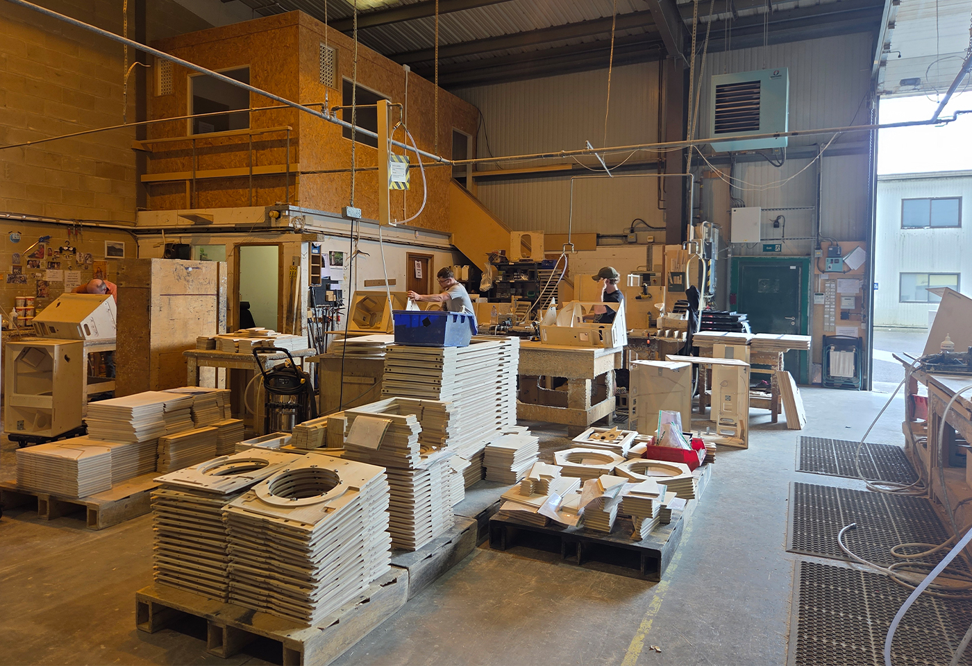 Hand assembly of a speaker cabinet at the Sarivale workshop