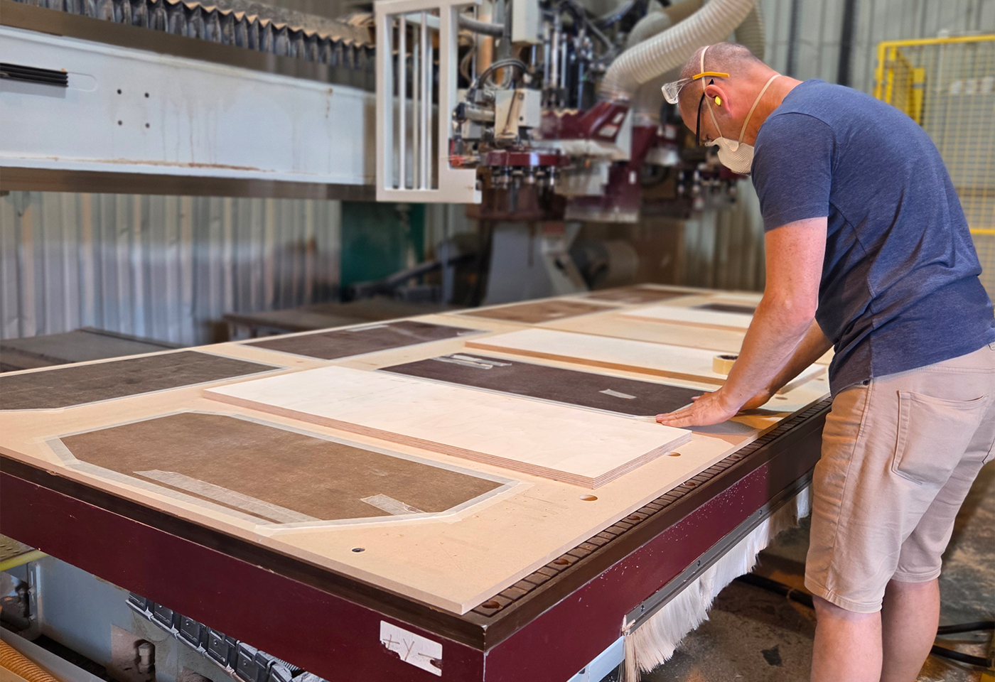 CNC machining of birch plywood speaker cabinet panels at the Sarivale workshop in Calne.