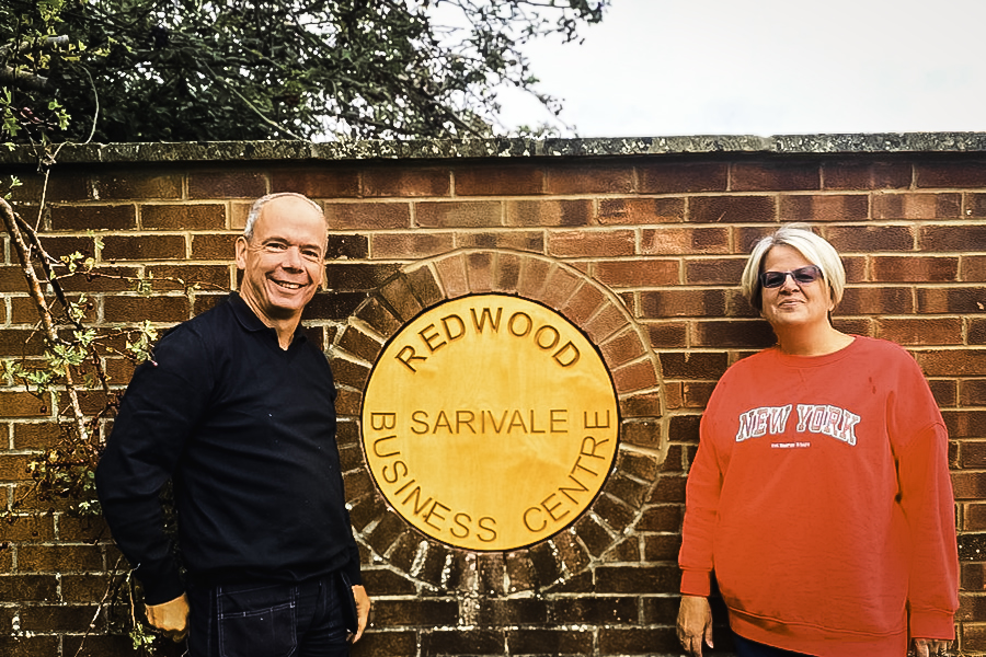 Directors Alan Finnigan and Kathryn Bigwood beside the Sarivale sign at the Calne site.